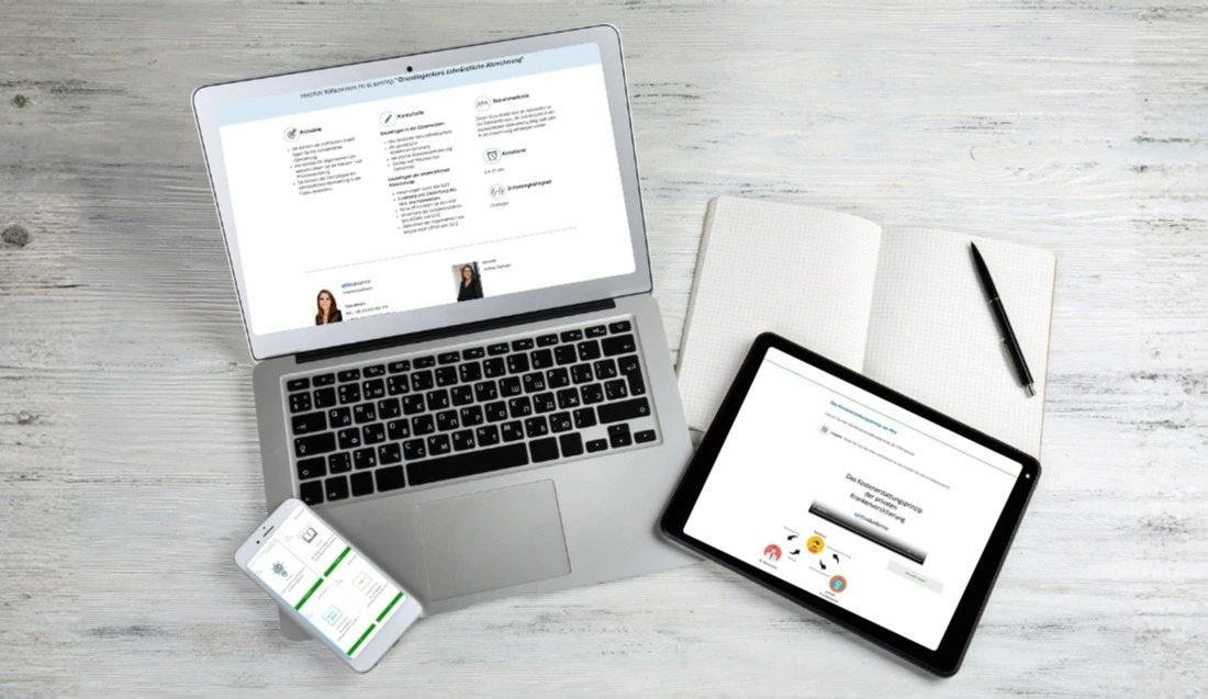 Person hält Tablet mit Spitta-eLearning-Kurs zahnärztliche Abrechnung – Grundlagenkurs zahnärztliche Abrechnung online | Spitta Akademie